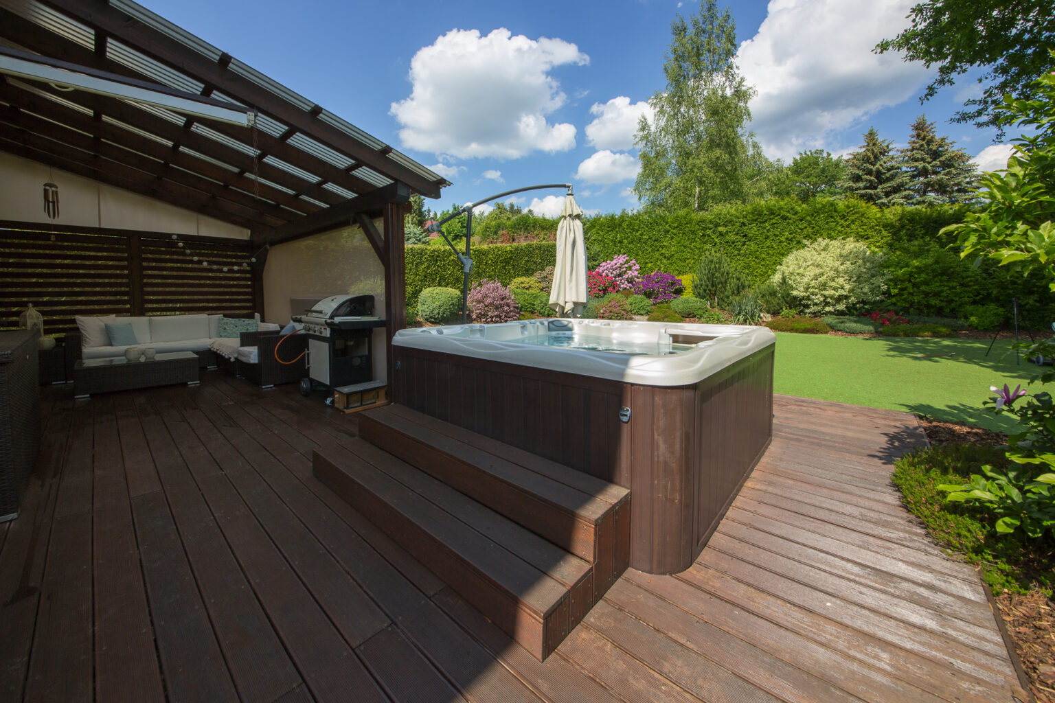 Sundance Spas whirlpool in the family garden